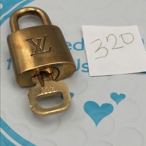 Louis Vuitton Accessories - Louis Vuitton Lock and key set 320 Louis Vuitton Accessories - Louis Vuitton Lock and key set 320